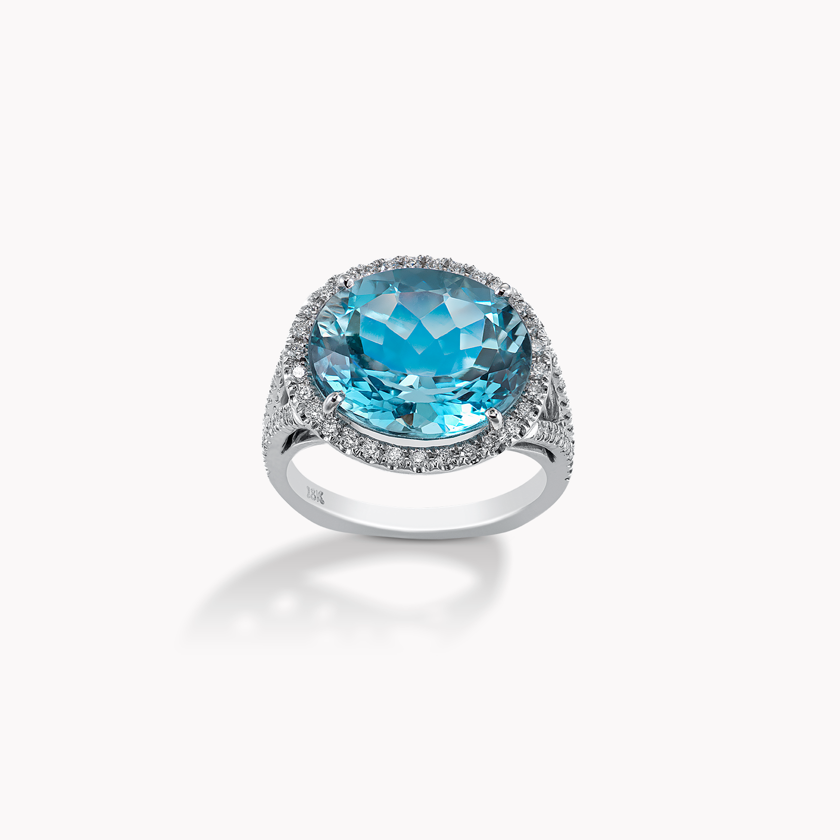 18kt White Gold Blue Topaz and Diamond Ring